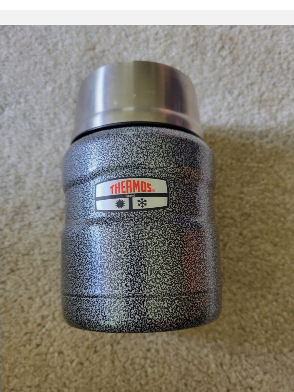 Camping or traveling Thermos gray speckled insulated jar with stainless lid